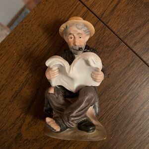 Vintage 1970’s figurine of man reading a book